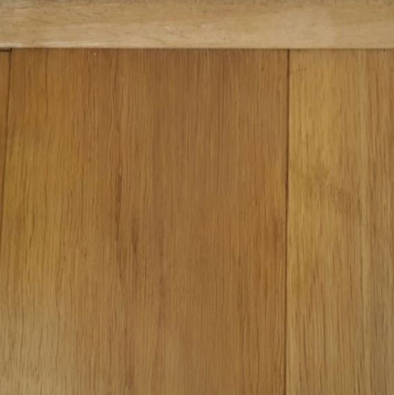 Houten vloer na herstel schroeischade